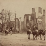 People survey the ruins of the Bank of Chambersburg and Franklin House in Chambersburg, destroyed by Confederates under Brig. Gen. John McCausland (1864, R. Newell, photographer; Library of Congress)