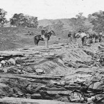 Onlookers view the bodies of Confederate soldiers in the Bloody Lane (September 1862, Alexander Gardner, photographer; Library of Congress)